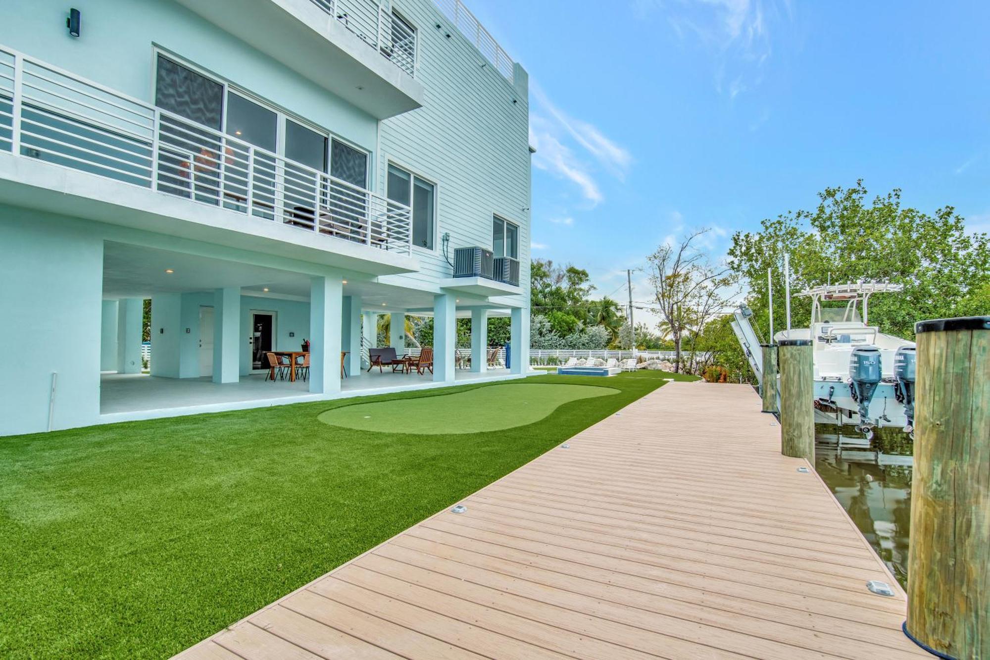 Keys Casa - Elegant Waterfront Retreat, Sleeps 16, Elevator, Private Dock, Putt-putt